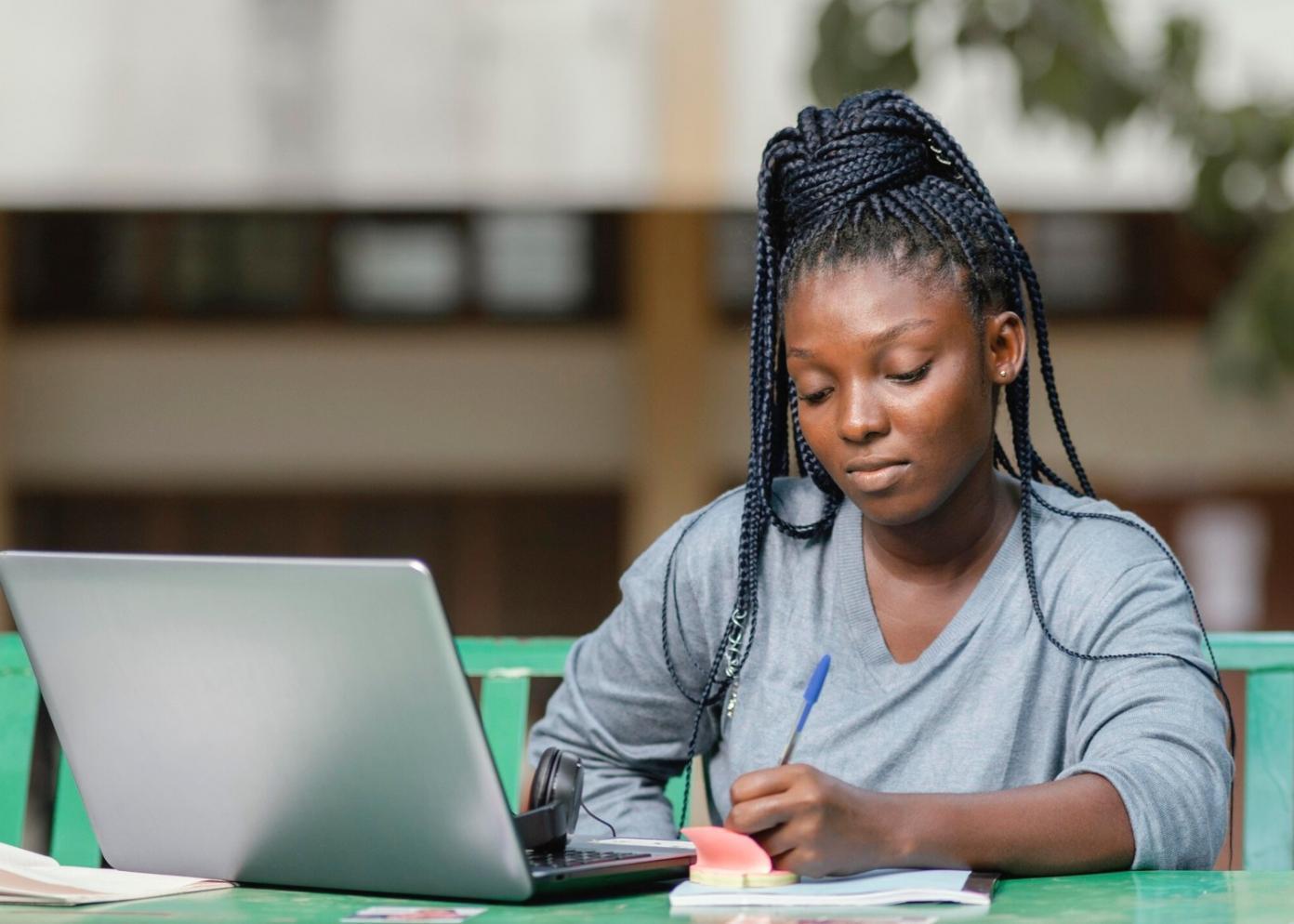 International students collaborating on financial planning strategies in a modern learning environment